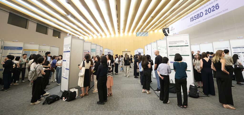 Two early career scholars collaborating